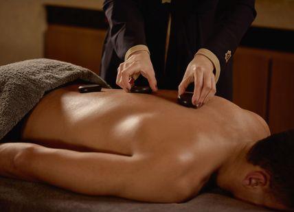 An image of a man having Treatment. Akasha Holistic Wellbeing Centre at Hotel Cafe Royal