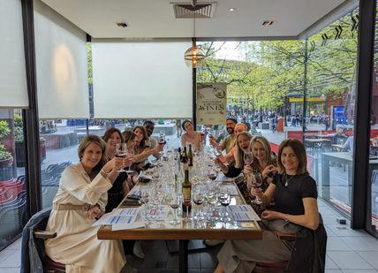 An image of a group of people sitting at a table, Wine Tasting Masterclass with Three Course Meal at Davy's. Davy's Wine Bar